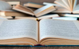 Books sitting on a table