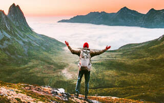 Man in Backcountry Embracing Challenges