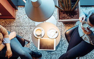 Two women having coffee